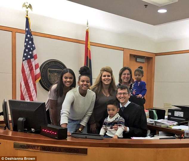 3b946aab00000578-4059274-good_news_the_family_happily_celebrated_on_the_day_of_his_adopti-m-74_1482430122311