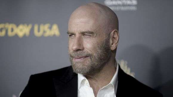 John Travolta tregon pse u bë tullac