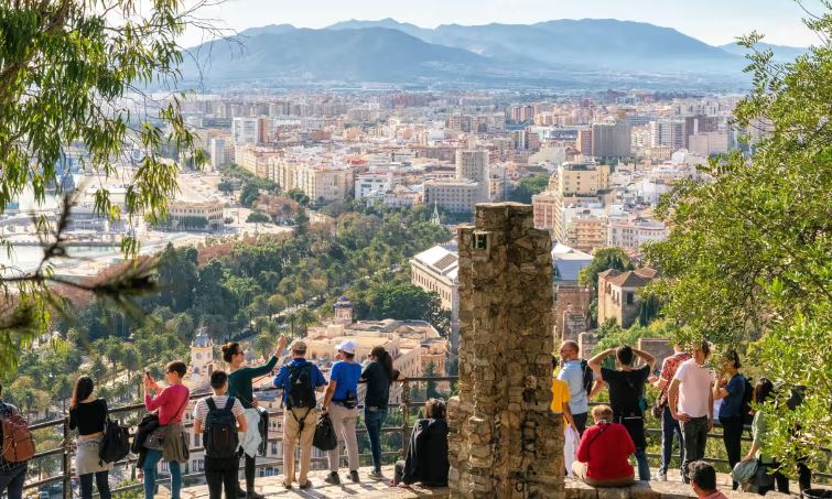 Turistët në Malaga. Fotografia: AndKa/Alamy